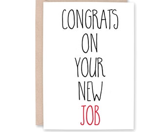 May include: A white card with black text that reads "Congrats on your new job" with the word "job" in red.