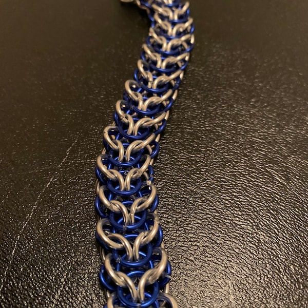 Blue and silver bracelet done in spinal elf weave.