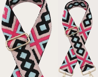 May include: A pink, blue, and black geometric patterned woven strap with gold metal hardware. The strap is adjustable and has a hook closure. Geo Hot Pink.