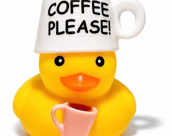 May include: A bright yellow rubber duck toy wearing a white ceramic-style mug on its head with the black text COFFEE PLEASE! printed on the front. The duck has a small pink mug held in front of its chest, a bright orange beak, and black eyes.
