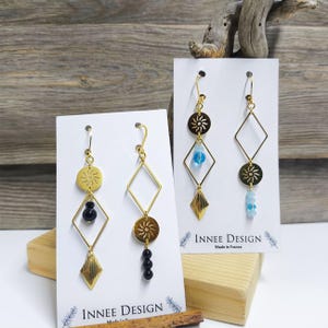Mismatched asymmetrical sun diamond onyx earrings in gold-plated stainless steel, available in Black or Frosted Light Blue