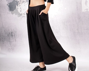 Black pants. Wide skirt pants. 7/8 pants. Ankle length pants. Wide black pants. Pants with pockets. Women pants. UM-067-PU