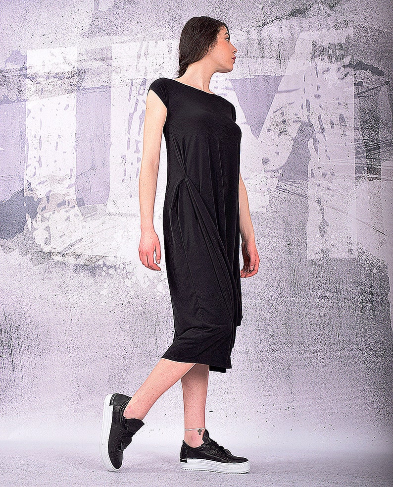 white eyelet dress Earth Angel Solid White Eyelet Lace Dress by KARLIE