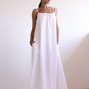 cute baggy dresses TrdSipl Plus Size Cotton Linen Maxi Dress for Women Flowy Swing Tiered Dress Cute Loose V Neck Short Sleeve Dresses Beige L