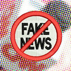 May include: A red circle with a diagonal line through it, with the text "FAKE NEWS" in black letters on a white background.