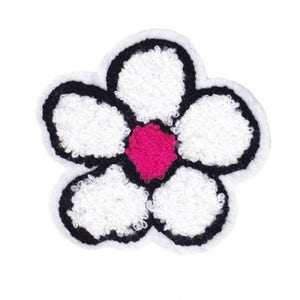 Può includere: Un fiore di feltro bianco con un contorno nero e un centro rosa. Il fiore è un design semplice con cinque petali.