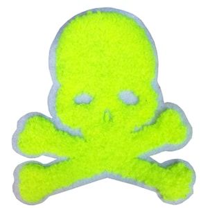 May include: A neon green skull and crossbones patch. The patch is made of fuzzy fabric.