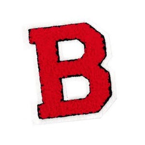 May include: Red felt letter B with white outline. The letter is a patch or applique.