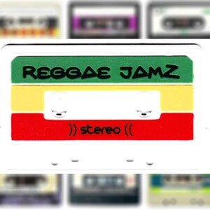 May include: A white cassette tape with a green, yellow, and red design. The tape says "Reggae Jamz" in black letters and "stereo" in black letters.