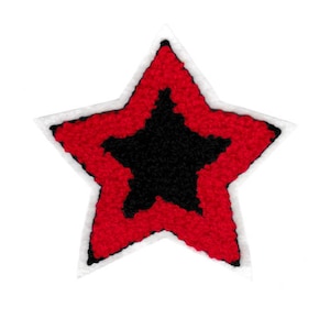 May include: A red star with a black star inside. The star is made of a fuzzy material.