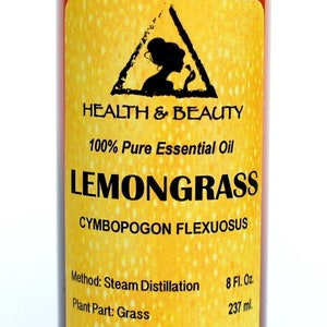 May include: A brown glass bottle with a black cap, labeled "HEALTH & BEAUTY 100% Pure Essential Oil LEMONGRASS CYMBOPOGON FLEXUOSUS Method: Steam Distillation Plant Part: Grass Country of Origin India 8 Fl. Oz. 237 ml."