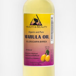 May include: A clear glass bottle with a yellow label that reads "HEALTH & BEAUTY Organic and Pure MARULA OIL SCLEROCARYA BIRREA" and contains 16 fluid ounces (473 ml) of marula oil. The label also states that the oil is all natural, cold pressed refined, obtained from kernels, and is from Namibia.