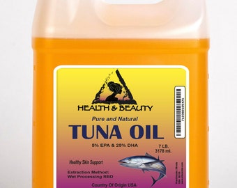 May include: A clear plastic jug filled with yellow liquid, labelled "Health & Beauty Pure and Natural Tuna Oil 5% EPA & 25% DHA 7 LB. 3178 ml. Healthy Skin Support Extraction Method: Wet Processing RBD Country Of Origin USA"