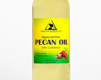 May include: A clear glass bottle with a white cap containing 2 fluid ounces (59 ml) of organic and pure pecan oil. The label is yellow with green accents and features the text "Health & Beauty", "Organic and Pure", "Pecan Oil", "Carya Illinoinensis", "Extraction Method: Cold Pressed Refined", "Country of Origin USA", and "Exp. date".