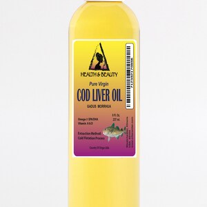 May include: A clear glass bottle of pure virgin cod liver oil with a yellow label. The label features a triangle with a woman's silhouette inside, the words "Health & Beauty", and the text "Pure Virgin Cod Liver Oil". The label also includes the scientific name for cod, "Gadus Morrhua", and information about the oil's omega-3 fatty acids, vitamins A and D, extraction method, and country of origin.