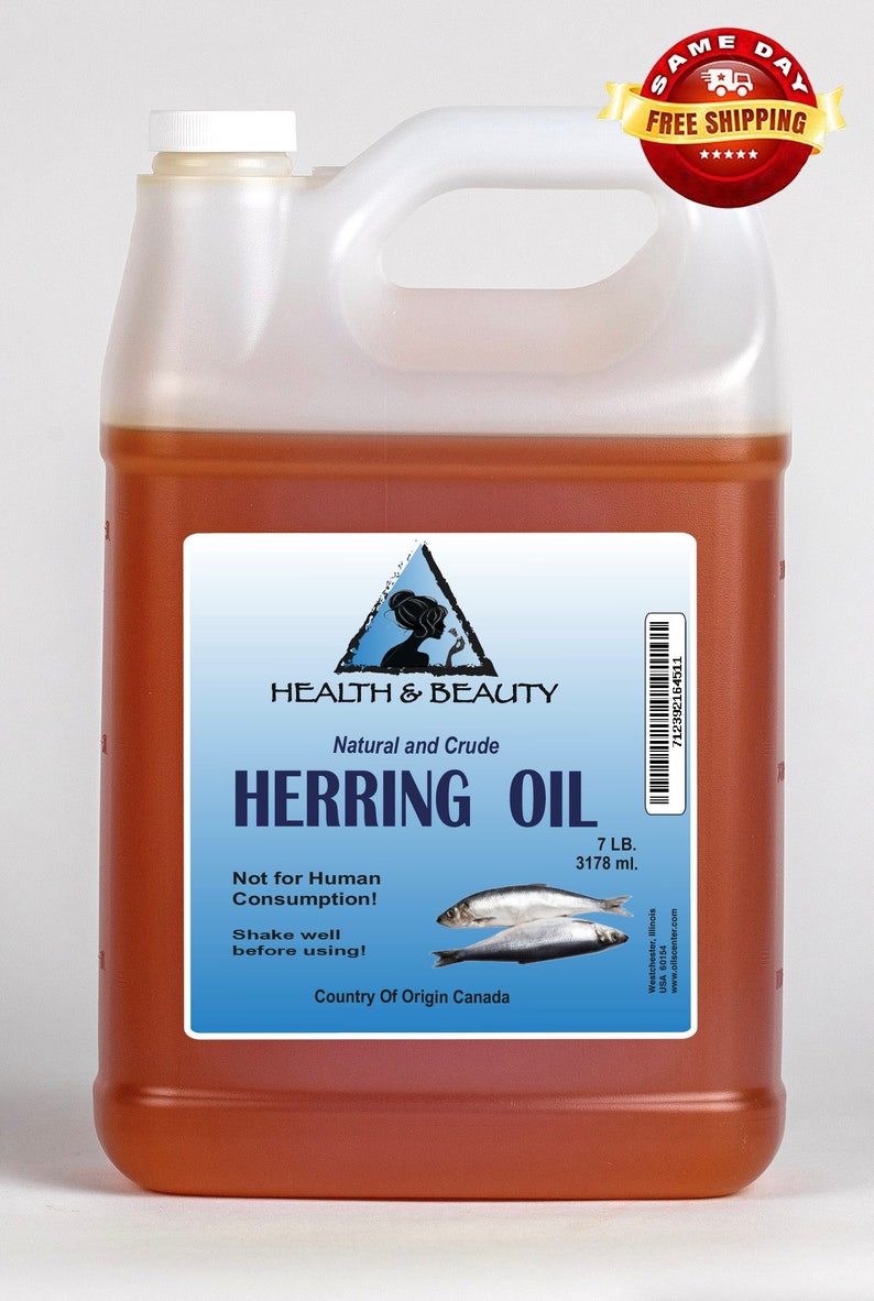 May include: A gallon jug of amber-colored herring oil with a blue and white label that reads "Health & Beauty Natural and Crude Herring Oil 7 LB. 3178 ml. Not for Human Consumption! Shake well before using! Country of Origin Canada".