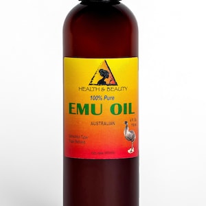 May include: A brown glass bottle with a black cap containing 100% pure Australian emu oil. The label is yellow with a red and orange gradient and features a black silhouette of an emu. The label also includes the text "HEALTH & BEAUTY", "100% Pure", "EMU OIL", "AUSTRALIAN", "4 FL OZ", "118 ml", "Extraction Type: Triple Refined", and "Exp. date".