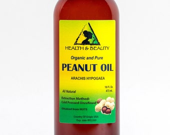 Puede incluir: Una botella marrón de aceite de maní con tapa negra. La etiqueta dice "Organic and Pure Peanut Oil" y "473 ml." El producto es "All Natural" y "Cold Pressed Unrefined."