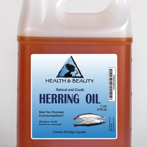 May include: A gallon jug of amber-colored herring oil with a white label. The label reads "Health & Beauty Natural and Crude Herring Oil 7 LB. 3178 ml. Not for Human Consumption! Shake well before using! Country of Origin Canada".