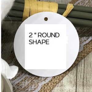 May include: A white round tag with a hole in the top. The tag says "2" ROUND SHAPE.