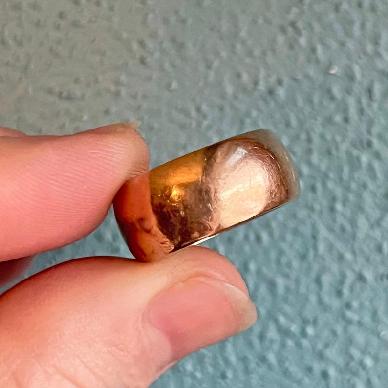 Vintage 1918 gold wedding band close up