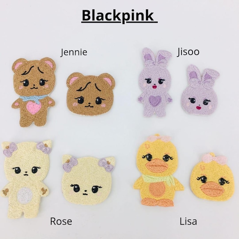 May include: Blackpink embroidered patches featuring various cartoon characters: a brown bear, a purple bunny, a yellow duck, and a white bear. The patches are labeled with the names Jennie, Jisoo, Lisa, and Rose.