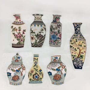 May include: Seven embroidered fabric patches depicting various styles of vases with floral and bird designs. The vases are in shades of white, blue, green, yellow, and brown.
