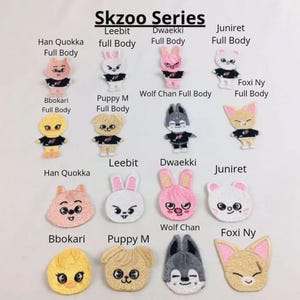 May include: A set of 10 embroidered iron-on patches featuring cartoon animal characters. The patches are in various colours, including pink, yellow, white, and grey. The characters include a fox, a wolf, a bunny, a quokka, and a puppy. The patches are labelled with the names of the characters, such as "Foxi Ny", "Wolf Chan", and "Puppy M".