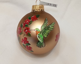 Green hummingbird ornament plus flowers glass round ornament; hand painted, direct from artist. Perfect gift for the hummingbird lover.