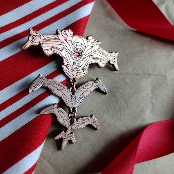 Pin colgante de robot