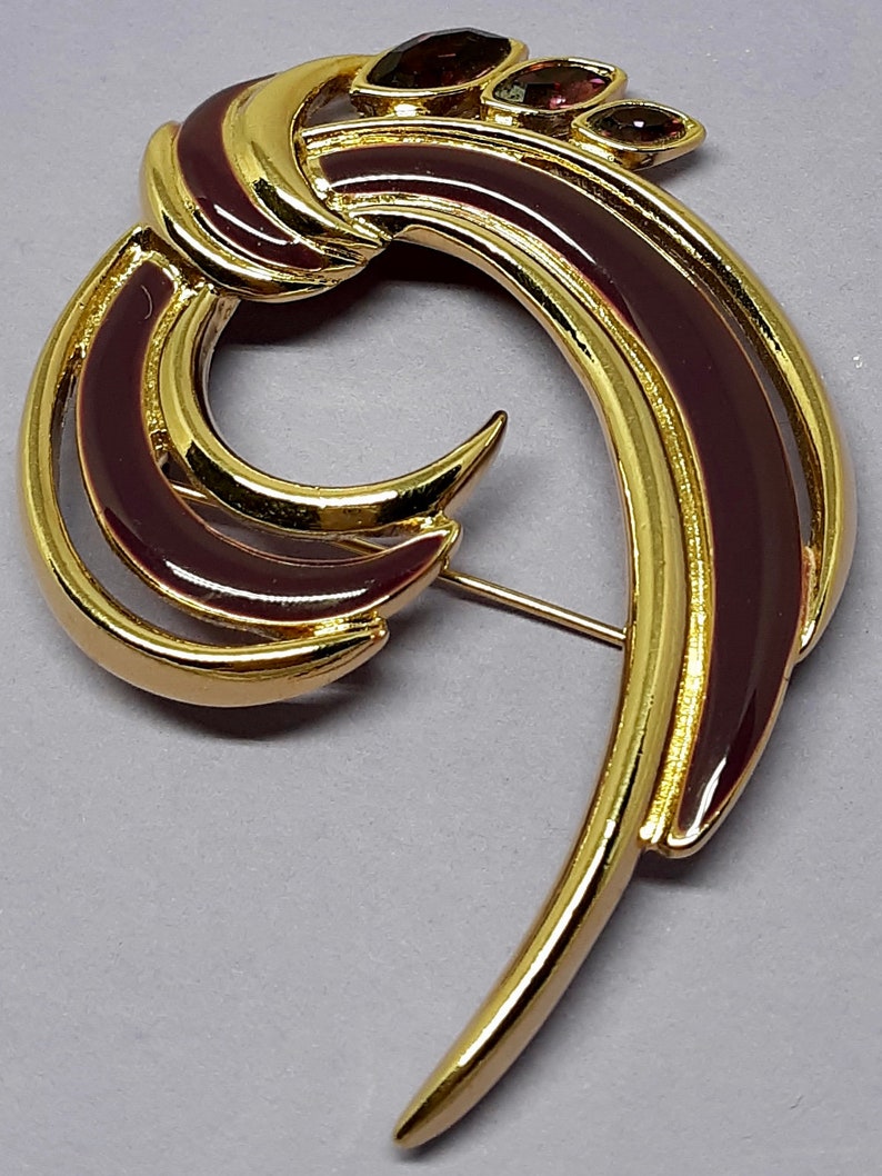 Vintage Trifari shops TM pin/brooch gold plated, purple enamel and rhinestones .
