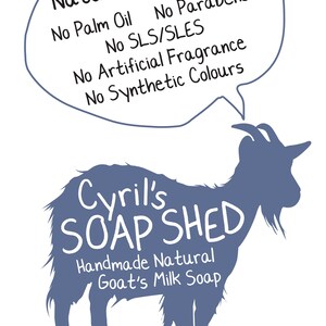 May include: A blue silhouette of a goat with the text "Cyril's SOAP SHED" and "Handmade Natural Goat's Milk Soap." A speech bubble above the goat reads "Natural Loveliness" and lists ingredients not included in the soap.