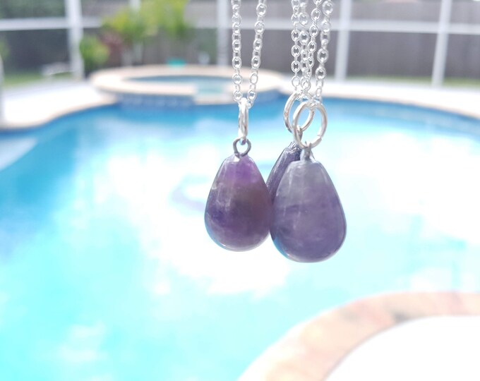 Amethyst gemstone pendant on a sterling silver necklace