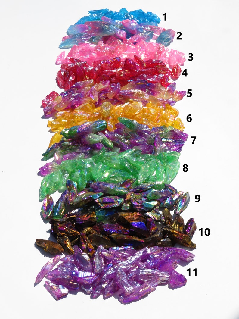 May include: Eleven rows of iridescent crystal chips in various colours, including blue, pink, red, yellow, green, brown, and purple. The chips are arranged in rows, with each row numbered 1 through 11.
