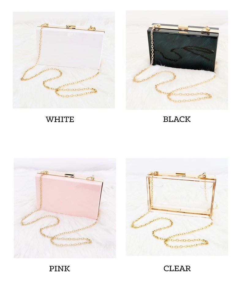 White, black, pink and clear purse