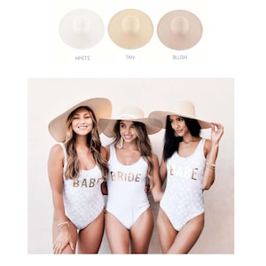 white sun hat, tan sun hat, blush sun hat. 3 tan sun hats worn by 3 girls.