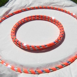 Adult 1 lb Weighted Hula Hoop for Hoop Dance Off Body Moves and Fitness Sm 36 med 38 lrg 40 folds for Travel & Carry USA made Orange