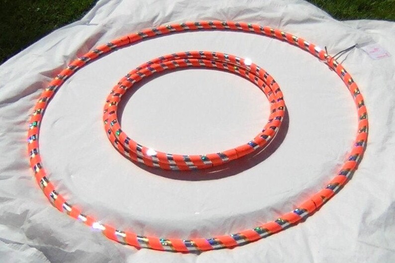 Adult 1 lb Weighted Hula Hoop for Hoop Dance Off Body Moves and Fitness Sm 36 med 38 lrg 40 folds for Travel & Carry USA made Orange