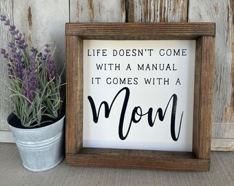 Life Doesn't Come With A Manual, It Comes With A Mom Wood Sign