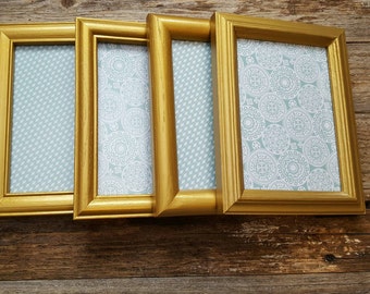 Set of four 5x7 gold metallic frames