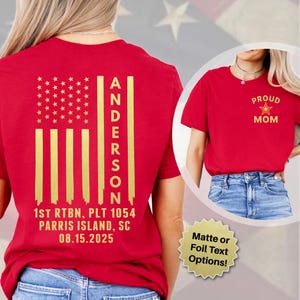 May include: Red t-shirt with a gold American flag design on the back, including the name "ANDERSON" and military unit details. A smaller image shows a red shirt with "PROUD MOM" text. The shirt offers matte or foil text options.