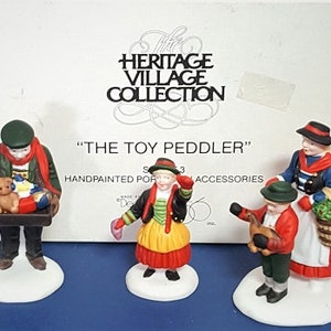 Department 56 “The Toy Peddler”- Set/3 Alpine Village Accessories - Retired