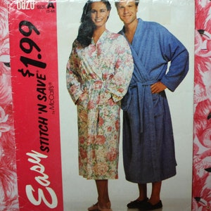May include: A sewing pattern for a robe with a floral print and a solid blue robe. The pattern is from McCall's and is called "Easy Stitch 'n Save". The price is $1.99.