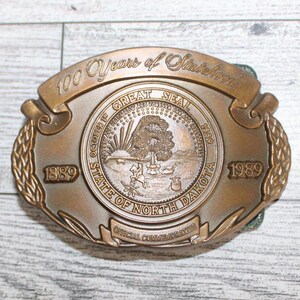 Vintage North Dakota 100 Years of Statehood 1889 to 1989 Brass Belt Buckle