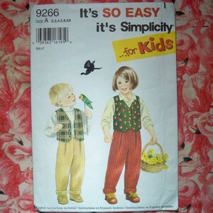 May include: A sewing pattern for children's clothing, featuring two children wearing different outfits. The pattern is titled "It's SO EASY it's Simplicity...for Kids" and the pattern number is 9266.