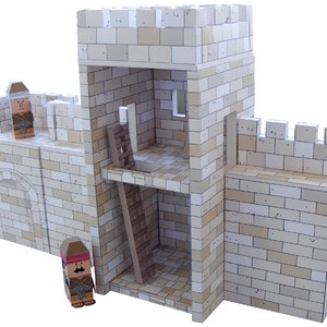 May include: A white cardboard model of a castle with a tower, a gate, and a ladder. Two small figures stand near the castle.