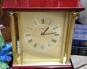 Howard Miller Model 645-591 Rosewood and Brass Pillar Mantle Clock