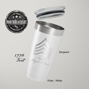 May include: White stainless steel tumbler with a silver lid. The tumbler has a silver chevron design and the text "Sergeant Miguel Otero" and "1776 Font".