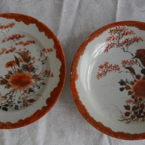 A pair of Japanese Hichozan Shinpo style porcelain plates