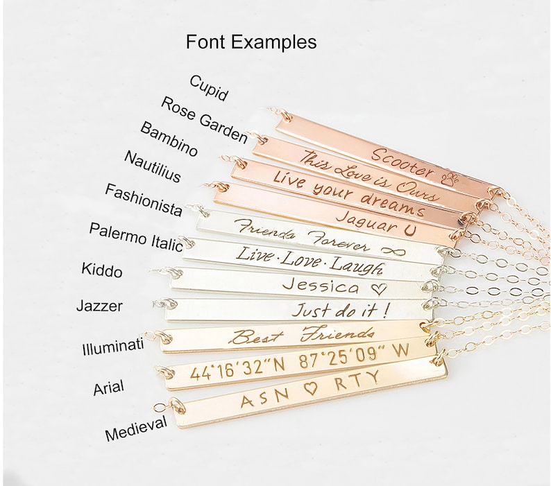 May include: A collection of horizontal bar necklaces in rose gold, silver, and gold tones, each featuring unique engraved text and fonts. The engravings include names, phrases like 'Live Love Laugh', 'Best Friends', and coordinates, displayed with labels for font styles.